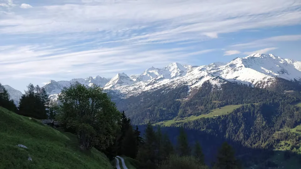 Panoramic Swiss Alps views from Le Gypaète, off-grid solar chalet Switzerland